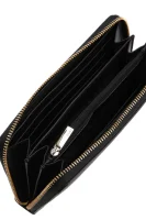 skórzany peňaženka pebbl DKNY 	čierna	