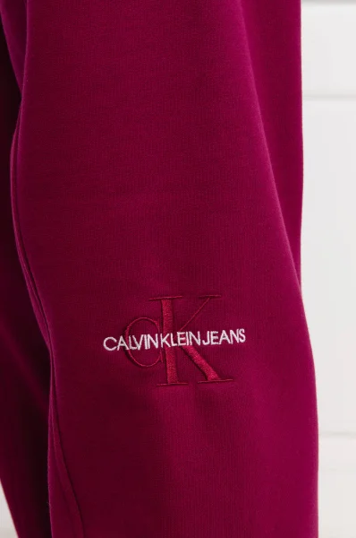 Teplákové nohavice MONOGRAM | Regular Fit CALVIN KLEIN JEANS 	fuchsia	