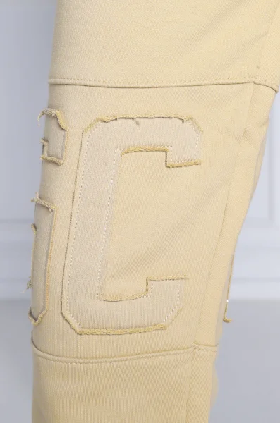 Teplákové nohavice | Regular Fit GCDS 	béžová	
