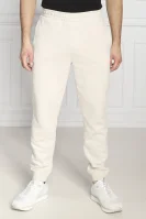 Teplákové nohavice | Regular Fit Calvin Klein Performance 	krémová	